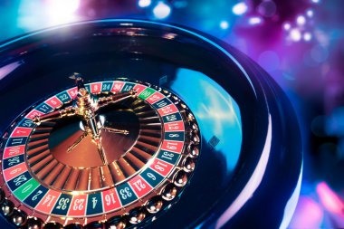 Live baccarat table with dealer and players